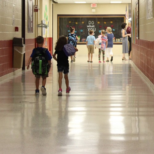 kids walking down hall