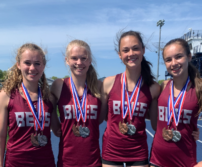 Relay Team Smashes School Record