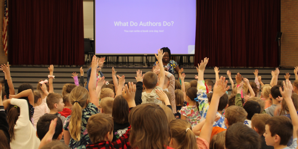 visiting author with students