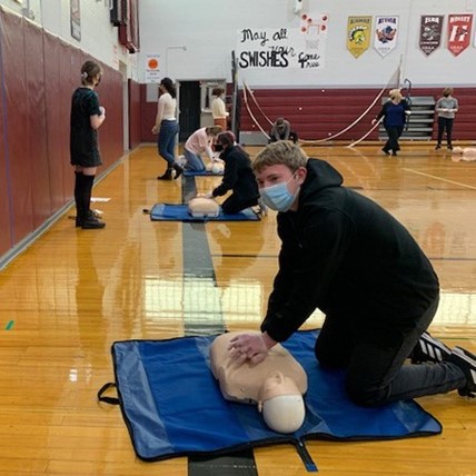 students learn CPR