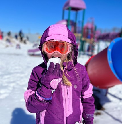 student playing outside