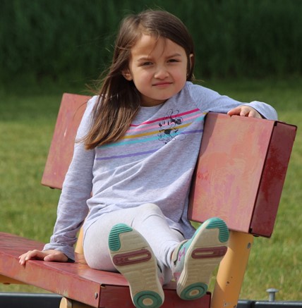 student on bench