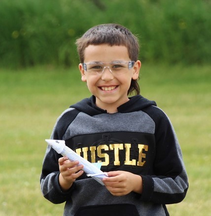 student with rocket experiment