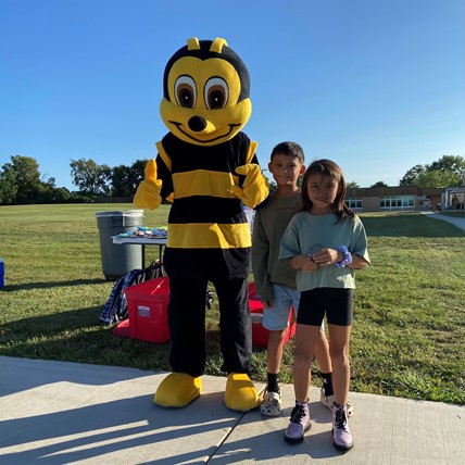 school mascot with students