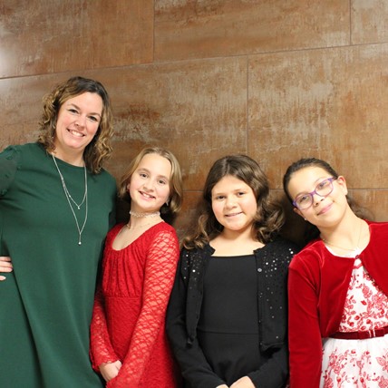 Principal Loftus with students