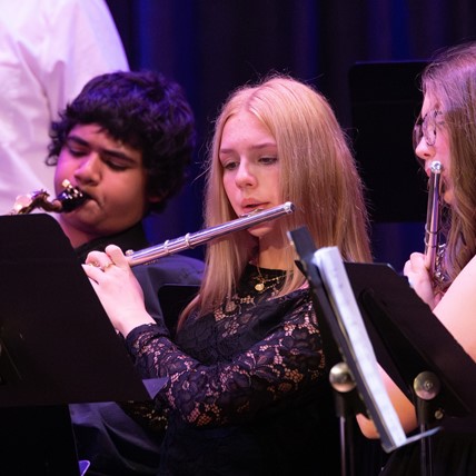 student playing flute
