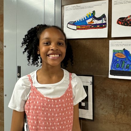 student with artwork