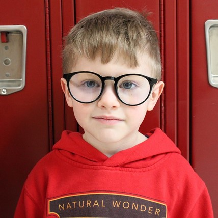 student looks at camera