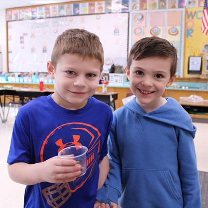 students plant seed