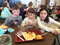 Elementary School students in the cafeteria.